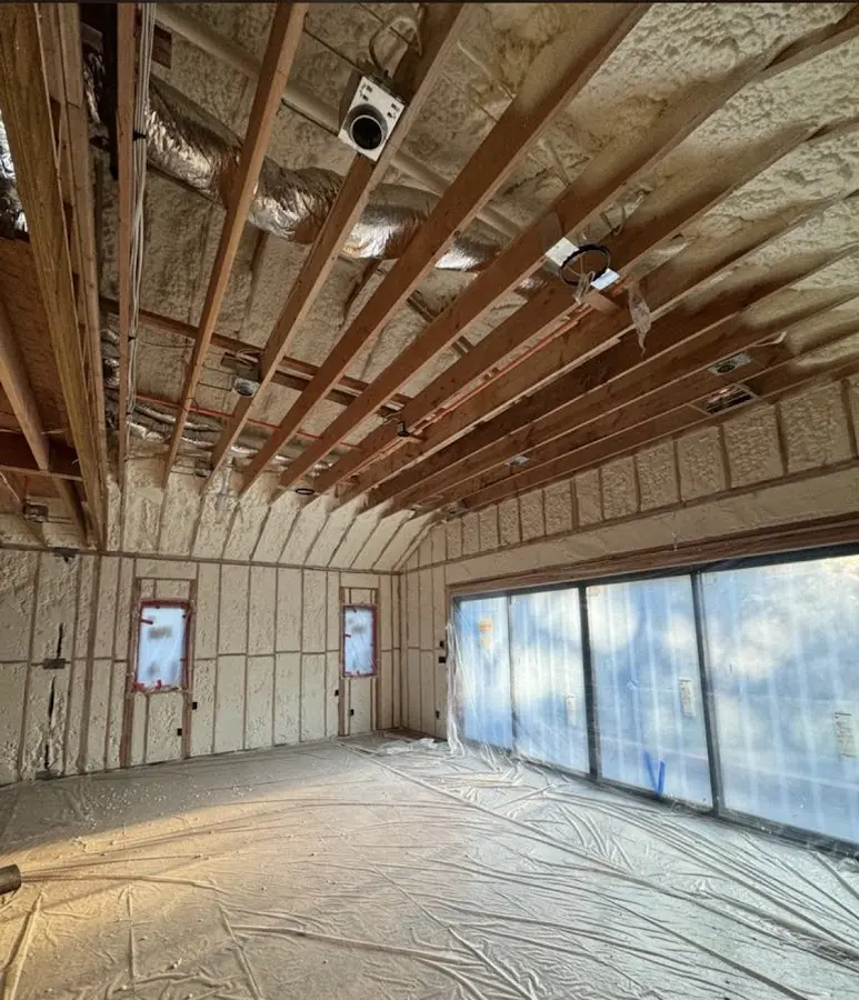 Interior walls and ceiling insulated with spray foam during new construction in Florida Ridge